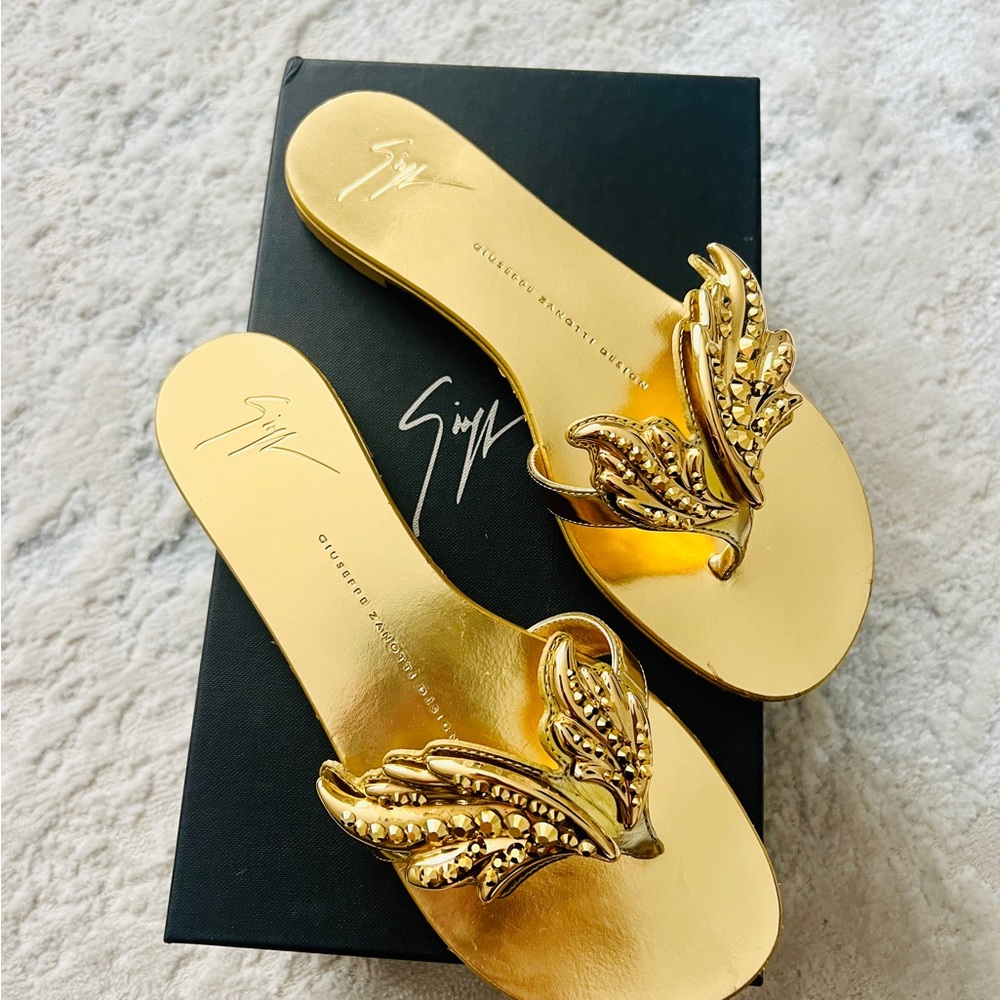 Giuseppe Zanotti gold angel wing slides with rhinestones. Size 37.